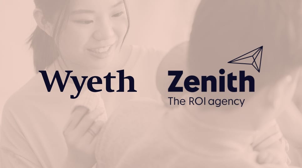 A woman smiles while holding a cloth next to a man cradling a baby, overlaid with the Wyeth and Zenith (The ROI agency) logos on a soft pink background.